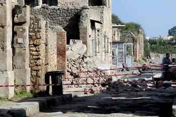 The house is cordoned-off following its collapse (AP Photo/Franco Castanò)