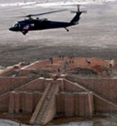 A US army helicopter flies over the stepped Ziggurat temple, a three-tiered edifice dating back to 2113 BC Photograph: ESSAM AL-SUDANI/AFP/Getty Images 