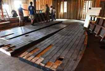 Work crews move pieces of a pirate ship into place in a building being renovated to house the new St. Augustine Pirate and Treasure Museum located at 12 Castillo Drive. Relics and exhibits are being brought from the Pirate Soul Museum in Key West. The new museum is scheduled to open Friday.