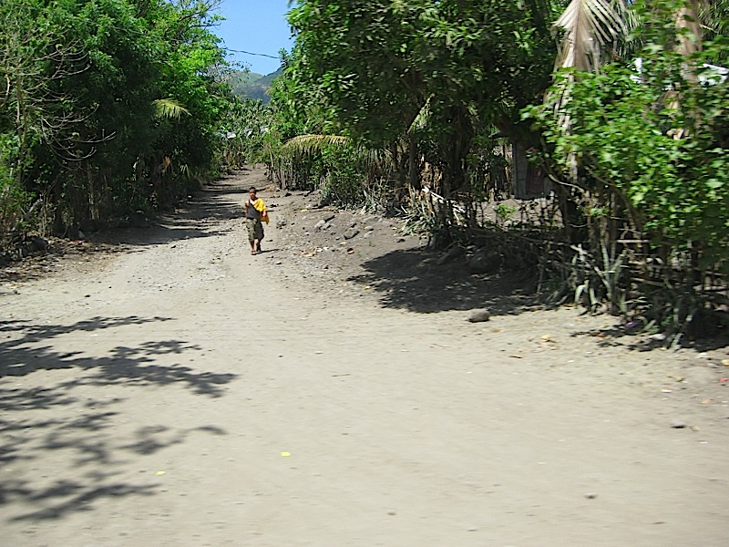 dirt road outside a town center in Marinduque province