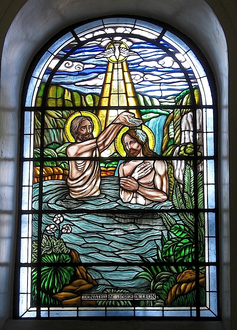 Malate Church stained glass window of Jesus' baptism