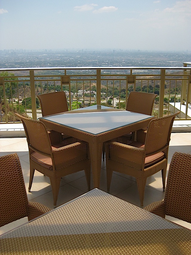 outdoor dining area of Timberland Sports and Nature Club with a view of Metro Manila