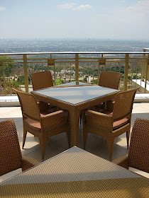 outdoor dining area of Timberland Sports and Nature Club with a view of Metro Manila