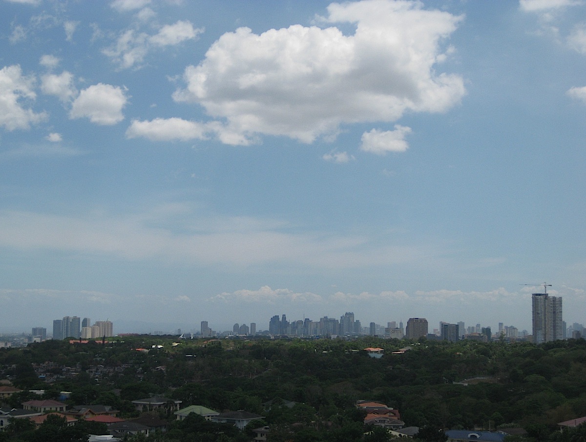 Quezon and Pasig City skyline from Capitol Hills Golf & Country Club