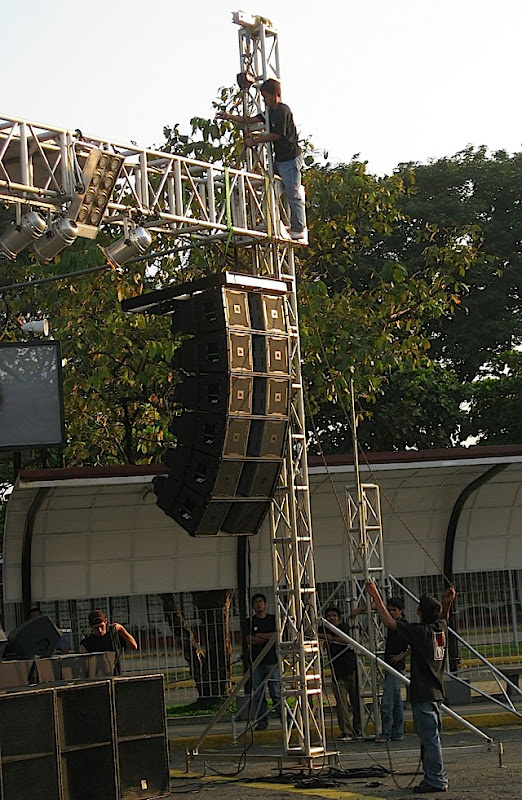 men setting up a stage