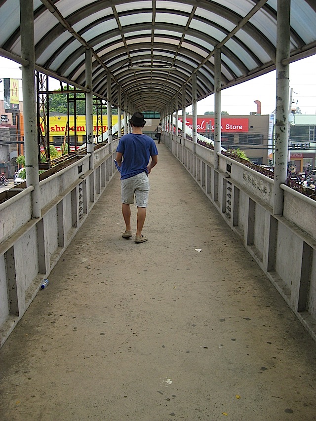 footbridge in front of Ateneo de Manila University crossing Katipunan Avenue
