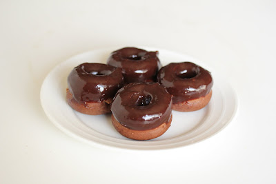 photo of four mini cake donuts on a plate