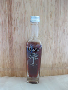 photo of a bottle of pomegranate liqueur