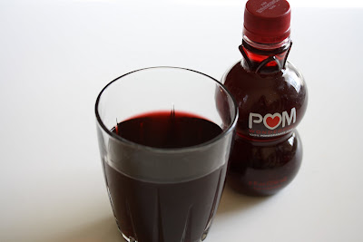 photo of a glass of pomegranate juice
