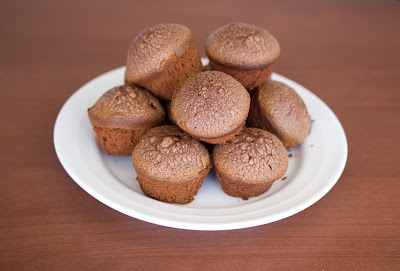 photo of a mini cakes piled on a plate