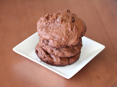 photo of a stack of three chocolate chunk muffin tops