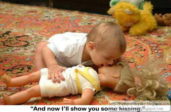 funny-baby-pictures-kissing-a-doll1