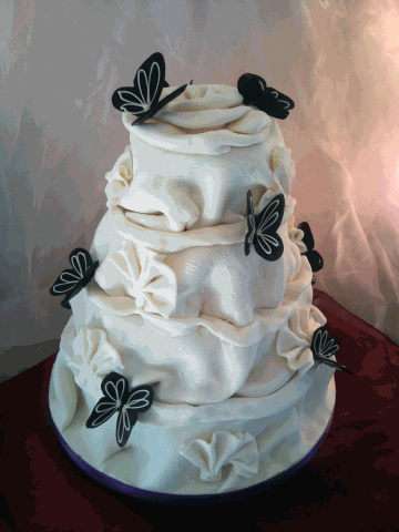 [Wedding-Cake-4-tier-Choc-Butterflies[2].gif]