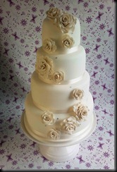 4-tier-clean-iced-with-roses