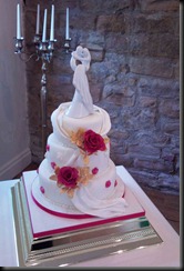 2-tier-drape-rose-and-figure-cake