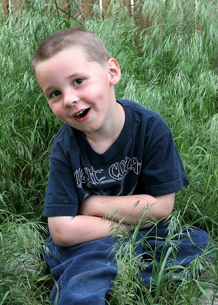 Caleb in the grass 2