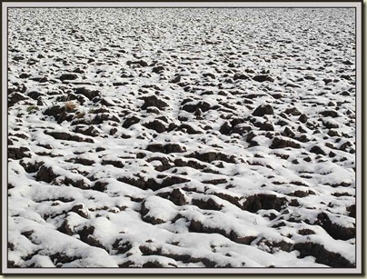 Ploughed field on a snowy morning