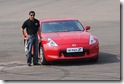 Narain Karthikeyan with the Nissan 370Z at the launch 20 Jan 2010 Red Nissan 370Z India Automotic Manual Images Pictures Pics Wallpapers Gallery Video Specifications Reviews
