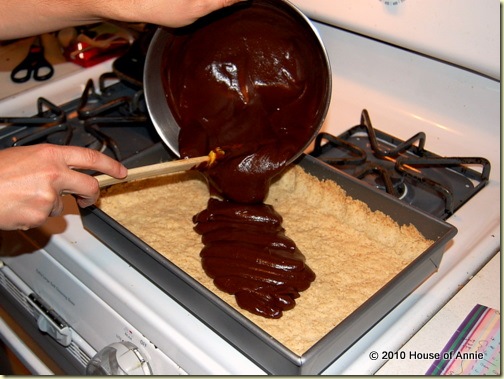 pouring chocolate into pie