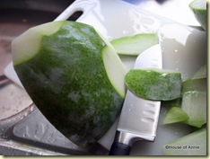 slicing skin off winter melon
