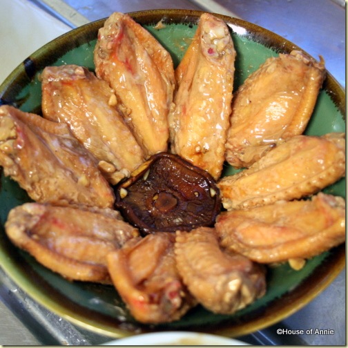 Arranging Chicken Wings in Bowl