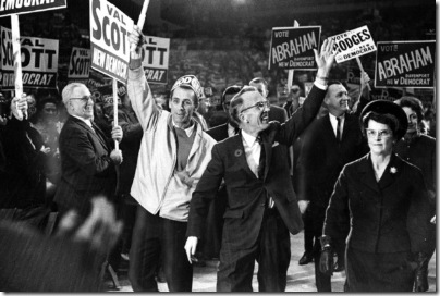 Tommy and Irma Douglas. Photo taken by Frank Lennon/Toronto Star Nov. 4, 1965. Also published 19691018 with caption: Tommy Douglas makes a triumphant entrance into a Maple Leaf Gardens rally during his 1965 rally. the New Democratic party leader will be 65 Monday.
