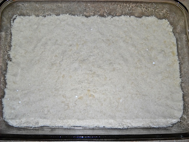 pressed crust in clear glass baking dish 