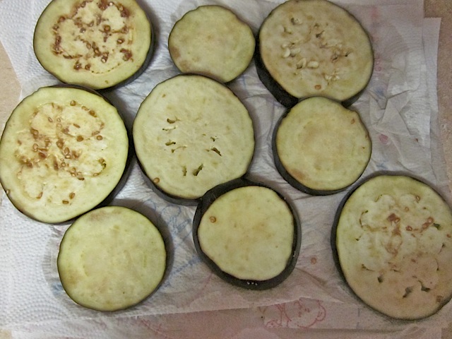 blot eggplant with paper towel to remove excess water 