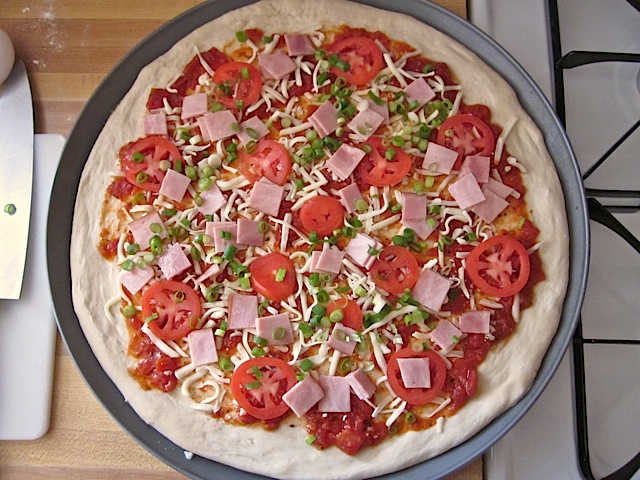 toppings added to pizza 