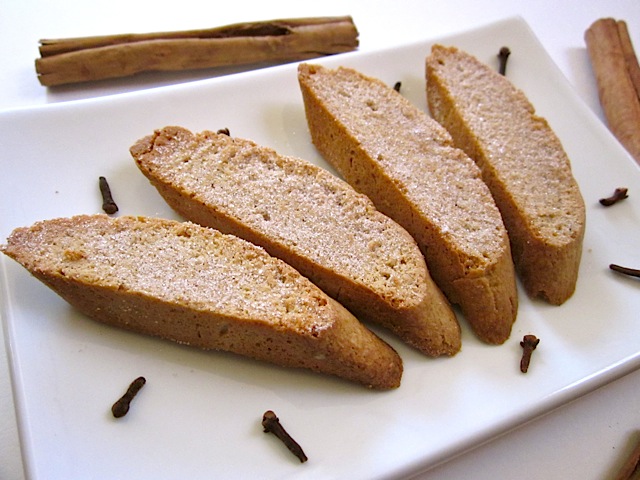 Cinnamon Spice Biscotti plated on white plate with cinnamon stick on the side 