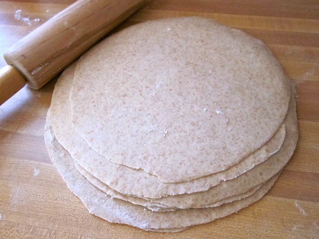 stack of raw tortillas ready to be cooked 
