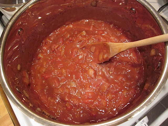 tomato sauce and paste added onion, garlic and ginger in pot. 