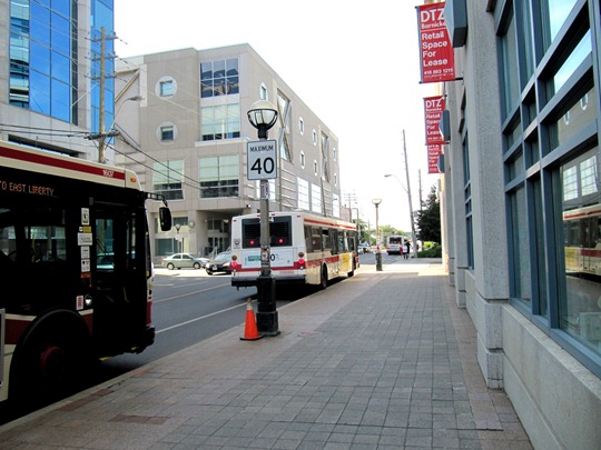 Three Toronto TTC buses blocking bike lane
