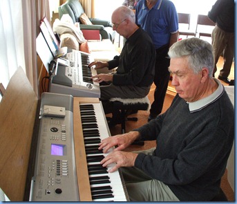 A rare gem! Peter Brophy, Club Musical Entertainments Bookings Manager, playing the Korg Pa1X with Jim Nicholson, Club Treasurer, accompanying on piano