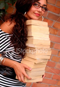 ist2_3974419-student-holding-books