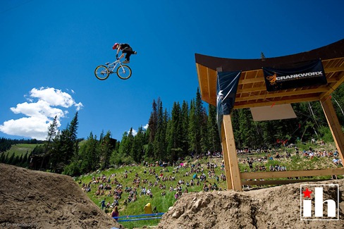Jack Fogelquist tailwhip during the Crankworx Colorado Slopestyle Final at the Trestle Bike Park in Winterpark Colorado.