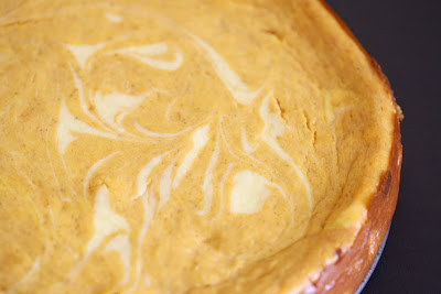 close-up photo of a marbled pumpkin cheesecake