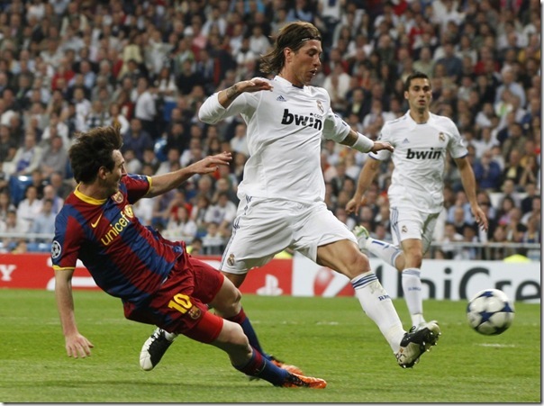 92596-barcelonas-messi-shoots-to-score-his-second-goal-against-real-madrid-d 92596-barcelonas-messi-shoots-to-score-his-second-goal-against-real-madrid-d