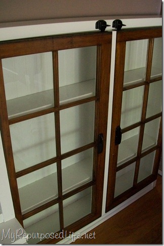 repurposed windows make cabinet doors