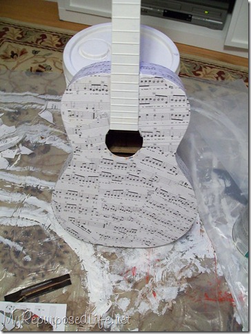 repurposed decoupaged guitar