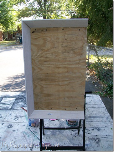 repurposed-door-bookcase repurposed door into a bookshelf
