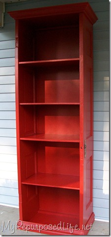 tall red bookshelf