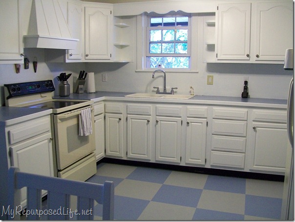 painted floor white cabinets