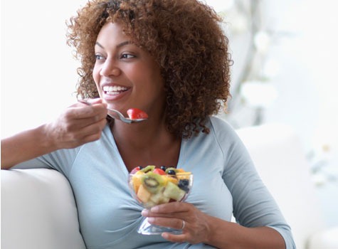 [black-woman-eating-fruit-475x350[2].jpg]