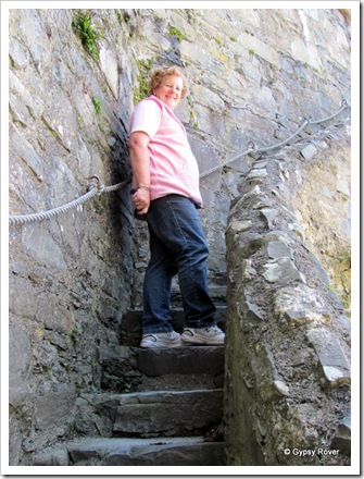 Heading up the narrow stairs to the parapet.