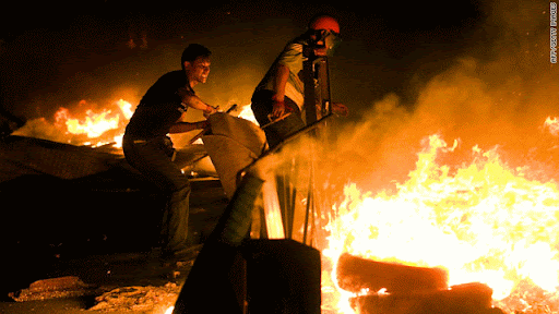 CNN%20-%20burning%20barricade%2020100516.gif