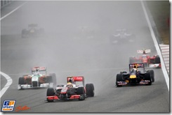 Lewis Hamilton (GBR) McLaren MP4/25 Adrian Sutil (GER) Force India F1 VJM03 and Sebastian Vettel (GER) Red Bull Racing RB6 battle for position. 
Formula One World Championship, Rd 4, Chinese Grand Prix, Race, Shanghai, China, Sunday 18 April 2010.
