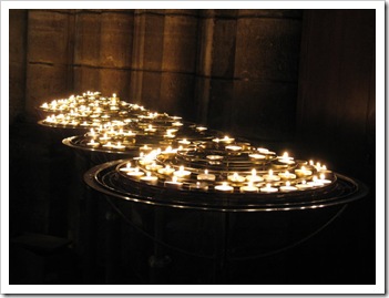 Candles_in_St__Denis_by_Kamilye