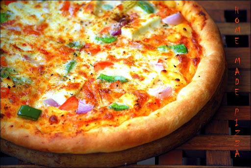 Golden baked pizza,hot and Yum!! Golden baked pizza,hot and Yum!!