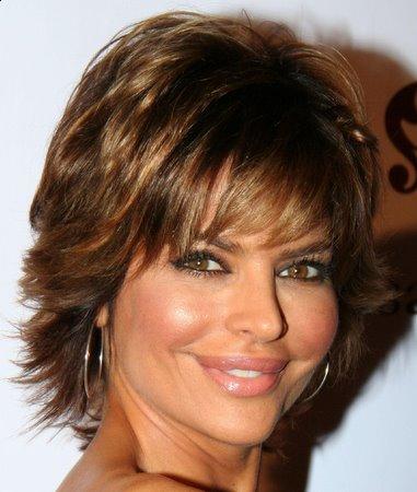 For creating a medium hairstyle, Rinna trims her gorgeous tresses slightly 